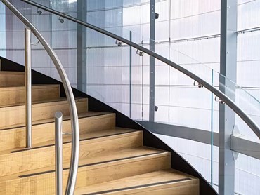 TemperShield bent glass is seamlessly integrated into the design of the staircase