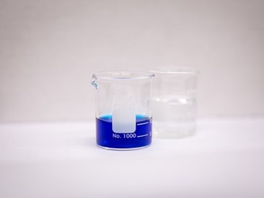 A beaker containing a methylene blue solution. Credit: Meredith Forrest Kulwicki/University at Buffalo
