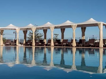 Poolside Cabanas: Rich Agora curtaining with Précontraint 502 conical canopies
