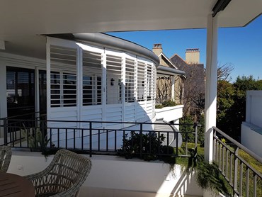 Openshutters plantation shutters in residential patio