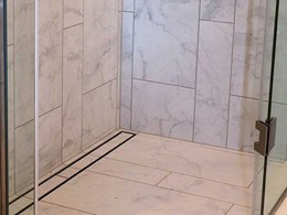 Specifying tile over shower trays in open concept bathrooms