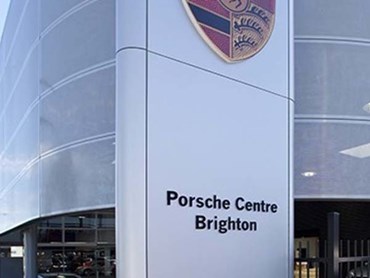 The Porsche Centre used perforated metal for its signature look

