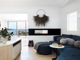 Interior designer’s holiday home features a double sided Escea 