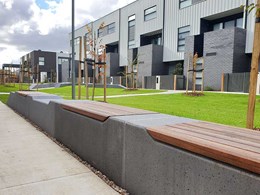 Bespoke concrete bench seats wrap around garden spaces at Altona North park
