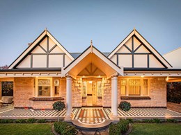 Classic checkerboard tessellated design complements American Tudor home