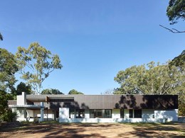White painted brick references mid-century modern look at Chandler house