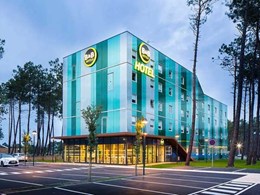 Danpal facade system helps hotel merge with forest landscape