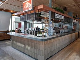 Immersive Canberra Airport Tap Room adds tactility with Ash Grey brick tiles 