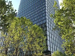 Custom Venetian blinds contribute to energy efficiency of Hassell-designed office tower