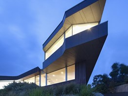 Dramatic, angular home looms over the Victorian coast