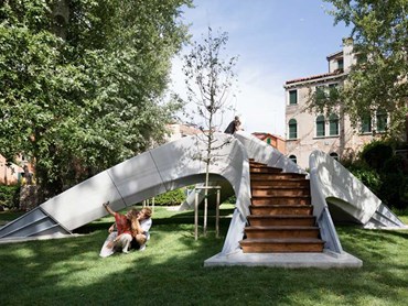 Striatus is an arched, unreinforced masonry footbridge made from 3D-printed concrete