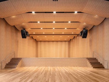 The Bowral Memorial Hall featuring custom curved SUPALINE panels on the ceiling and stage walls