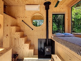 Small cabin interior with timber ecoply panels