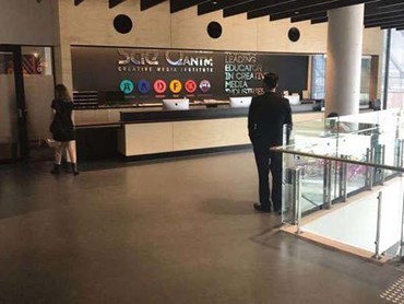 Screed Rubber Flooring With Concrete Look Installed At Sae Quantm