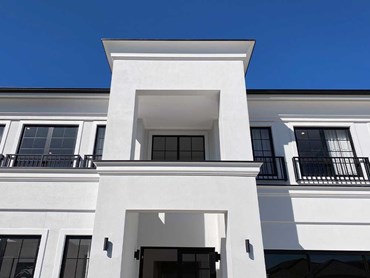 Ascot Home featuring a white double-storeyed French Provincial façade