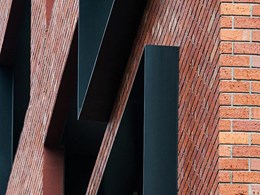 Signature facade on Collingwood apartments features brick inlay 