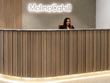 The curved reception desk created with Porta Contours timber lining boards