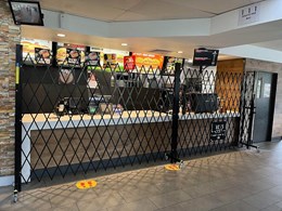 Crowd control barriers secure fast food kiosk at Melbourne service station
