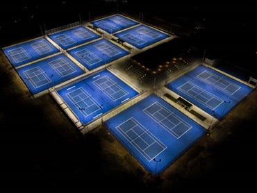 Tennis courts illuminated night
