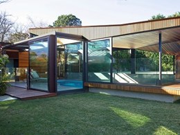 Melbourne poolhouse with vented roof, sliding walls and glazing ensuring year round use